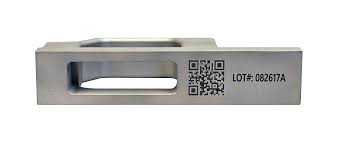 Laser-engraved QR code and lot number marking on a machined part