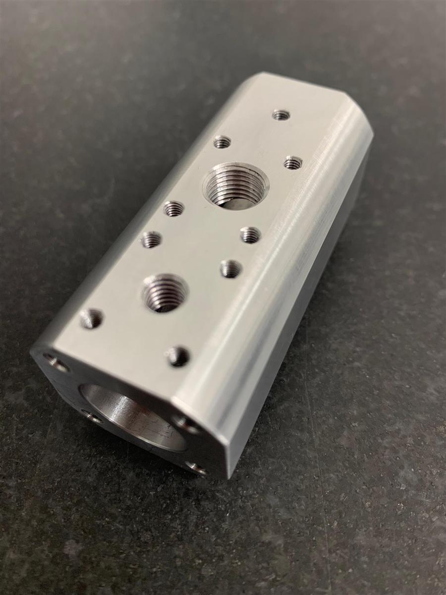 CNC-milled aluminium manifold block with tapped ports
