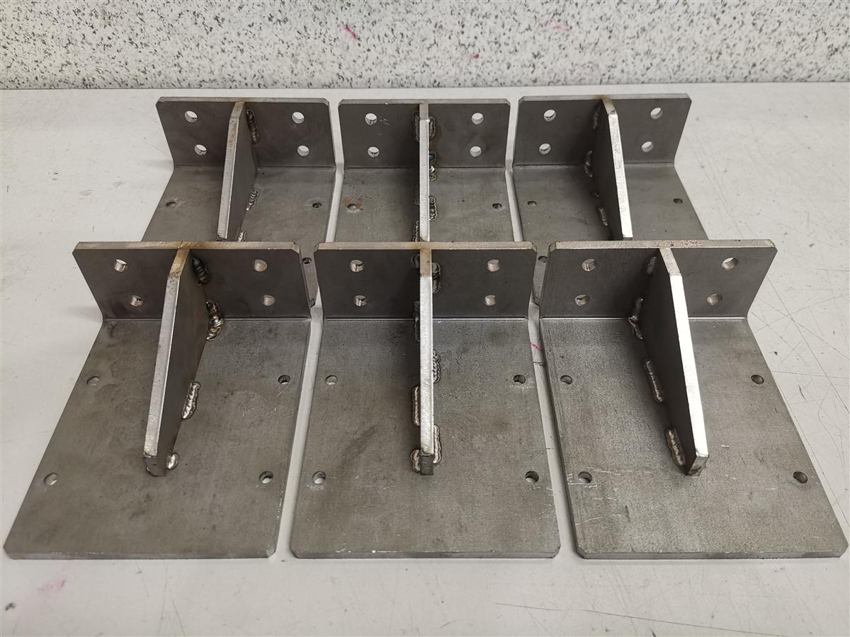 Welded angle-bracket base plates